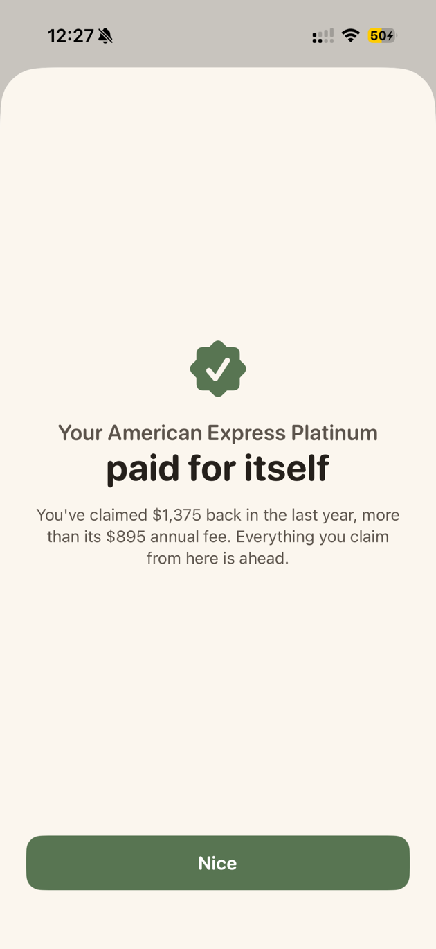 A celebration screen announcing the card paid for itself, with claimed value above the annual fee